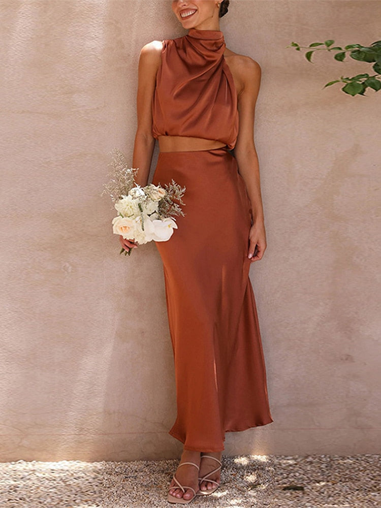 Conjunto Longo de Cetim Verde Claro com Blusa Gola Alta e Saia Fluida – Elegância e Sofisticação