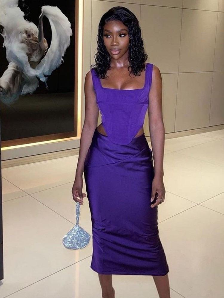 Vestido Longo Roxo com Corset e Recortes Laterais – Elegância e Sensualidade