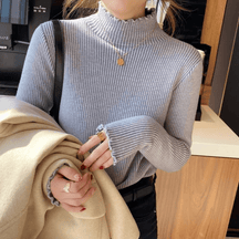 Blusa Peluciada e Canelada com Gola Alta