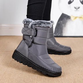 Bota Feminina de Inverno com Forro de Pelúcia e Cano Médio – Conforto, Estilo e Proteção Contra o Frio