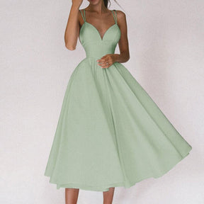 Vestido Longo de Alças Finas com Decote Profundo e Saia Rodada – Elegância e Sofisticação para Momentos Únicos