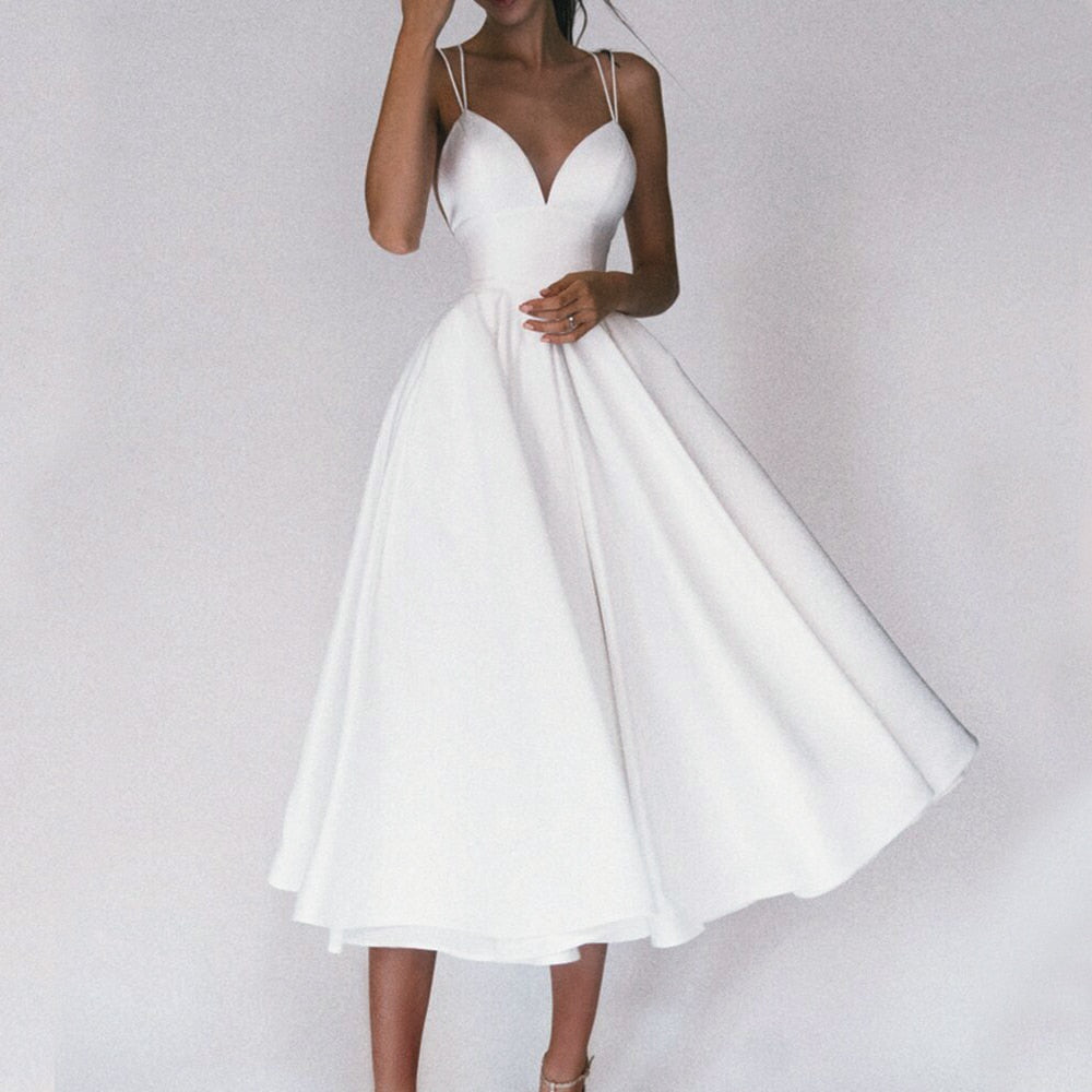 Vestido Longo de Alças Finas com Decote Profundo e Saia Rodada – Elegância e Sofisticação para Momentos Únicos