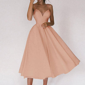 Vestido Longo de Alças Finas com Decote Profundo e Saia Rodada – Elegância e Sofisticação para Momentos Únicos