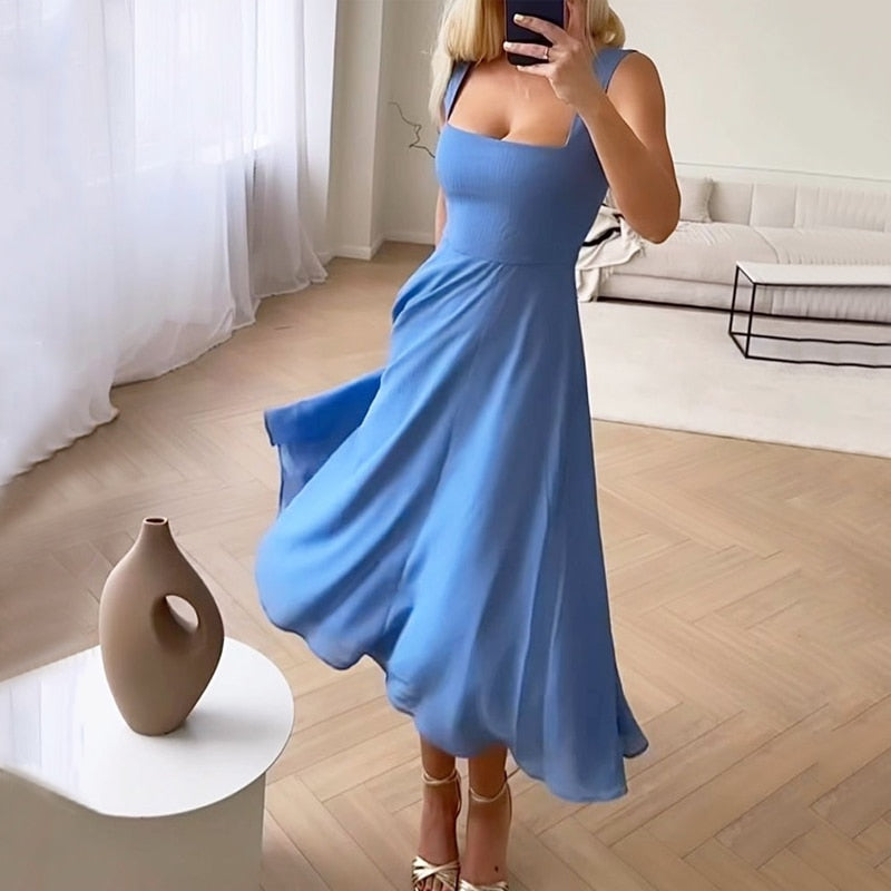 Vestido Midi Branco com Decote Quadrado e Saia Evasê – Elegância Clássica e Atemporal